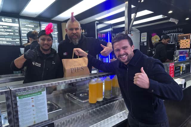 Apprentice star Phil Turner from Turner's Pies pops down as Spud Man visits Spud Fusion in Portsmouth. Pictured: Ruman Islam from Spud Fusion, Spud Man and Phil Turner