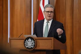 Prime minister Sir Keir Starmer gestures as he delivers a statement in the media briefing room of 9 Downing Street in central London, after US president Donald Trump's threats to ramp up tariffs until a deal is reached for the US to buy Greenland.