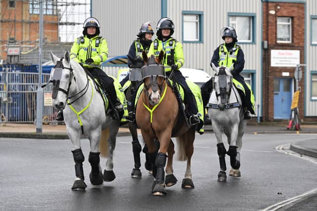 Mounted Police on the road outside Fratton Park ahead of the EFL Sky Bet Championship match between Portsmouth and Southampton at Fratton Park