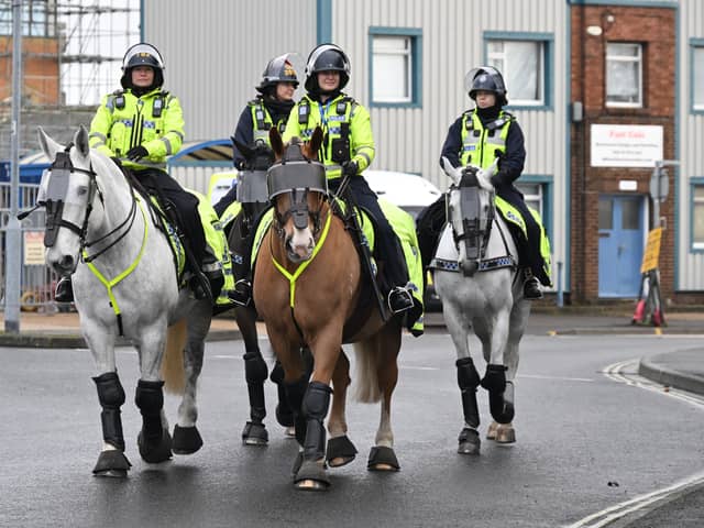 Mounted Police on the road outside Fratton Park ahead of the EFL Sky Bet Championship match between Portsmouth and Southampton at Fratton Park