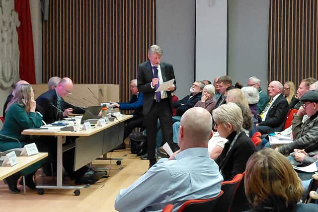 Cllr Phil Munday asking questions at Southleigh Strategic Site Consultation Forum January 28
