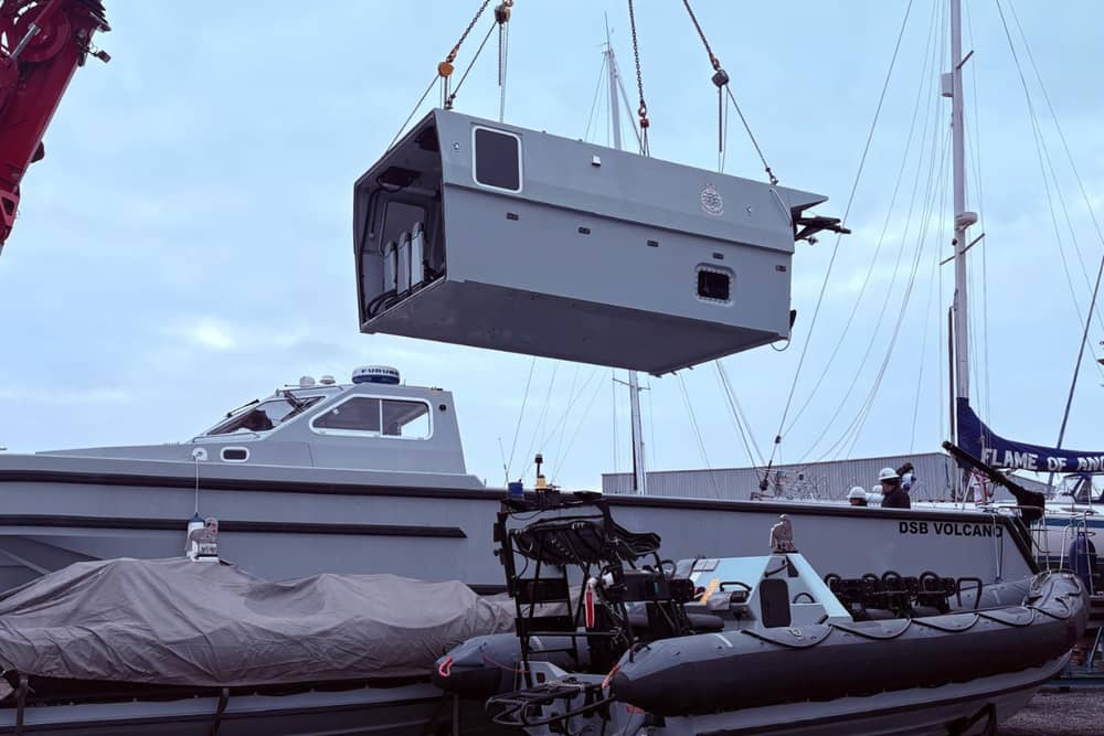 New jobs have been secured for Gosport as UK Docks wins major contracts to support Royal Navy and MoD police boats. Pictured: Engineers working on the DSB 05 Volcano in Gosport.