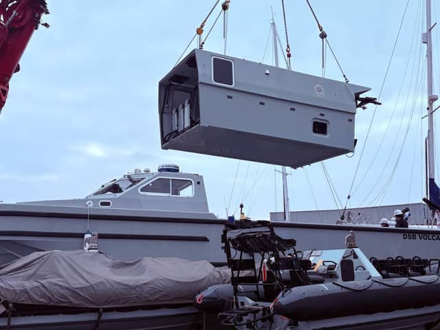 New jobs have been secured for Gosport as UK Docks wins major contracts to support Royal Navy and MoD police boats. Pictured: Engineers working on the DSB 05 Volcano in Gosport.