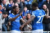 Ebou Adams celebrates with Millenic Alli after scoring Pompey's third goal in the 3-0 win over West Brom. Picture: Graham Hunt/ProSportsImages