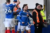 Conor Chaplin and his team-mates celebrate his first Pompey goal in almost eight years. Picture: Graham Hunt/ProSportsImages