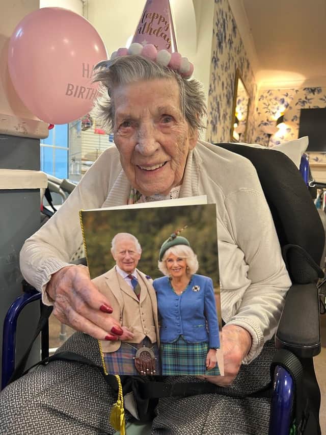 Joan Geary with her birthday card from King Charles III