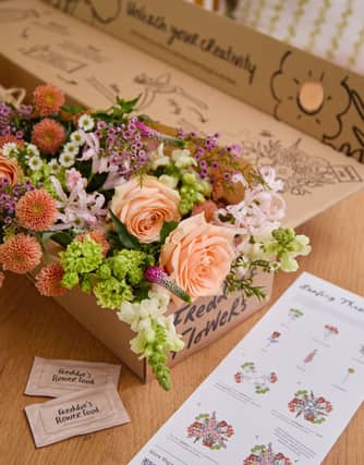 The blooms are carefully wrapped and boxed for delivery.
