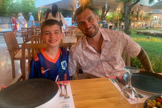 WO2 Glen Clifton and Theo. The Clifton family moved to Dubai temporarily for a deployment, believing that Theo's EHCP provision would be maintained.