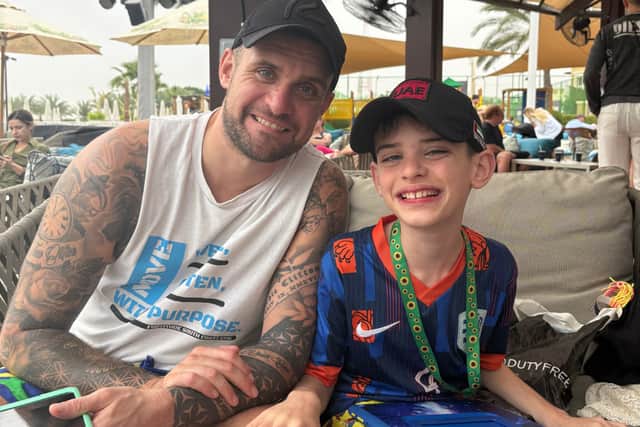 WO2 Glen Clifton and his son Theo. The Clifton family went through years of tribunals to secure his special needs education.