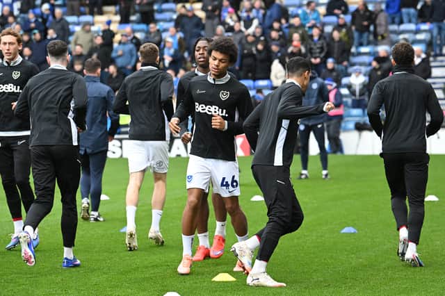 Tayo Singerr warming up with Pompey's first-team squad ahead of last month's south-coast derby. Picture: Graham Hunt/ProSportsImages