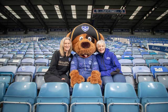 From left, Clare Martin from Pompey in the Community and Becki Simmons from Sparks with Nelson at Portsmouth Football Club.