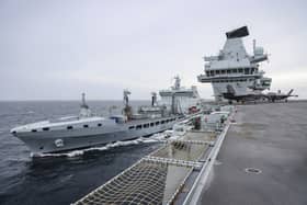 Female Royal Fleet Auxiliary staff report that the force's maternity policies are "horrific", and it's making them choose between a career and family life. Some have reported to have had abortions because of the policy. Pictured: RFA Tidesurge replenishing HMS Prince of Wales as fuel is pumped across.