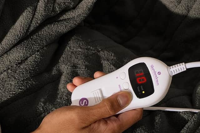 The blanket has 10 heat settings, and it's machine washable