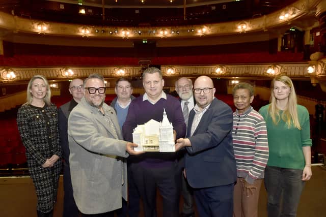 Scaffolding has gone up in preparation for the start of the regeneration work at The Kings Theatre in Albert Road, Southsea.


Pictured is: (l-r) Sabrina Buckland from Ascia, Steve Gisby from Ascia, Jack Edwards, deputy CEO at The Kings Theatre, Paul Fleming from Ascia, Damon Repton, chair of trustees at The Kings Theatre, Councillor Hugh Mason and Kings Theatre trustee, Councillor Steve Pitt, leader of Portsmouth City Council, Marie Costa, Kings Theatre trustee and Cerys Mitchell from Pritchards Architects.


Picture: Sarah Standing (130226-5685)