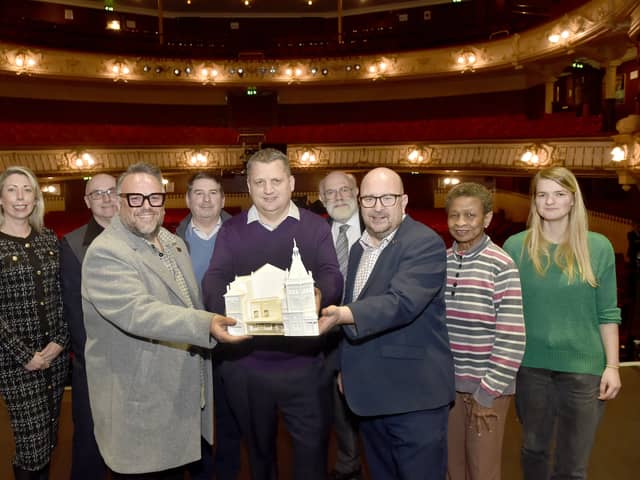 Scaffolding has gone up in preparation for the start of the regeneration work at The Kings Theatre in Albert Road, Southsea.


Pictured is: (l-r) Sabrina Buckland from Ascia, Steve Gisby from Ascia, Jack Edwards, deputy CEO at The Kings Theatre, Paul Fleming from Ascia, Damon Repton, chair of trustees at The Kings Theatre, Councillor Hugh Mason and Kings Theatre trustee, Councillor Steve Pitt, leader of Portsmouth City Council, Marie Costa, Kings Theatre trustee and Cerys Mitchell from Pritchards Architects.


Picture: Sarah Standing (130226-5685) 
