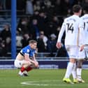 Terry Devlin is dejected at the final whistle following Pompey's agonising 1-0 defeat to Sheffield United. Picture: Graham Hunt/ProSportsImages