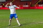 Terry Devlin celebrates with Pompey fans. Pic: Toyin Oshodi/ProSportsImages