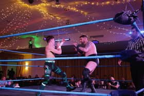 A Gosport Royal Navy base was transformed into a wrestling arena, with personnel, veterans, and families, being treated to a  night of action.