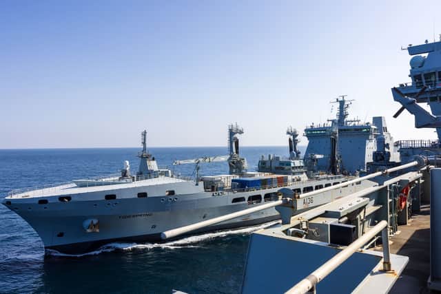 A female Royal Fleet Auxiliary sailor said "outrageous" maternity policies made her leave the force, with a suggestion being made to put her children "into care". Pictured: RFA Tidespring conducting a replenishment at sea exercise with HMS Prince of Wales.