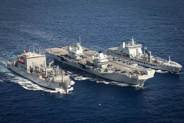 RFA sailors play a vital role in supporting Royal Navy deployments across the globe, keeping them at sea for longer and topping them up with essential supplies. From L: US cargo ship USNS Wally Schirra, HMS Prince of Wales and RFA Tidespring.