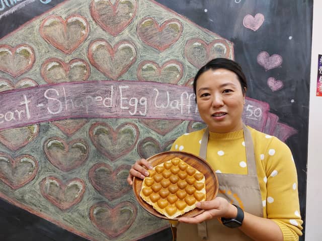 Olive Chan of Happy Lab Bubble Tea & Dessert in Cascades with their latest offering, a bubble waffle