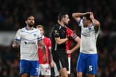 Marlon Pack and Regan Poole show signs of frustration during Pompey defeat at Wrexham