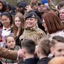 King Charles III meets with serving personnel and their families during a visit to the Royal Regiment of Artillery at Baker Barracks, Thorney Island