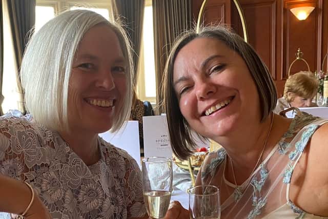 Pictured: Liz (left) with wife Julie (right)