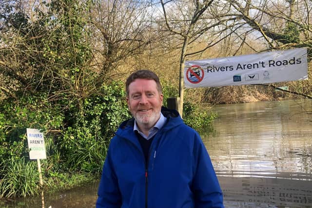 Cllr Malcolm Wallace at the demonstration in Droxford against the use of part of the River Meon by 'off road vehicles'