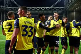 The Oxford United player celebrate their Championship win against Preston North End