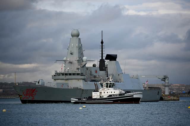 HMS Dragon leaves Portsmouth Harbour on Tuesday, March 10. Picture by Alison Treacher