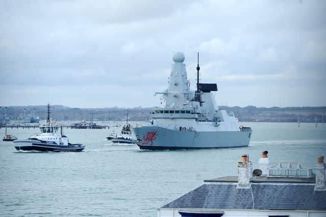 The government has been criticised for the amount of time it has taken for HMS Dragon to be deployed to the eastern Mediterranean. Pictured: The Royal Navy destroyer sailing past The Round Tower in Old Portsmouth.