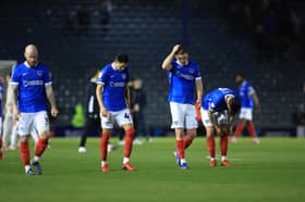 Pompey's players were devastated at the final whistle after a 2-1 defeat to Swansea. Picture: Simon Roe/ProSportsImages