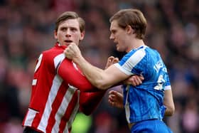 Svante Ingelsson, right, confronts Sheffield United midfielder Sydie Peck during the Sheffield derby last month