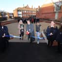 Pictured: Helen Bergin - landscape architect at PCC, Head teacher, Stuart Vaughan and Cllr Nicholas Dorrington with guests and school pupils marking the opening of the playground
Picture: Habibur Rahman