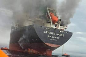 Thai cargo ship, Mayuree Naree, that was struck and set ablaze in the Strait of Hormuz. Iran has been targeting commercial ships following strikes from US-Israeli forces.