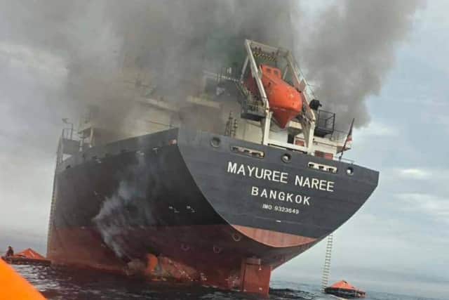 Thai cargo ship, Mayuree Naree, that was struck and set ablaze in the Strait of Hormuz. Iran has been targeting commercial ships following strikes from US-Israeli forces.