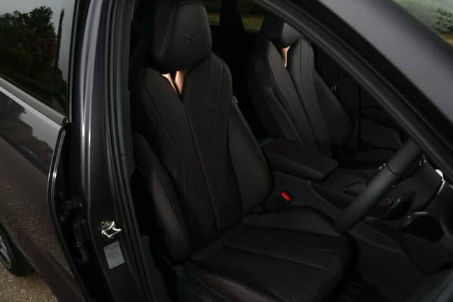 The seats are as comfortable as they are attractive, but they do eat into rear space a little