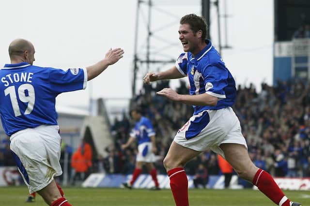 Lee Bradbury celebrates scoring for Pompey against Sheffield Wednesday in April 2003 during his Fratton Park playing days. Picture: Clive Rose/Getty Images