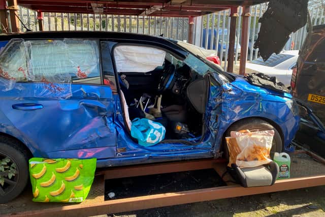 The damage Rachel's car sustained following the crash.