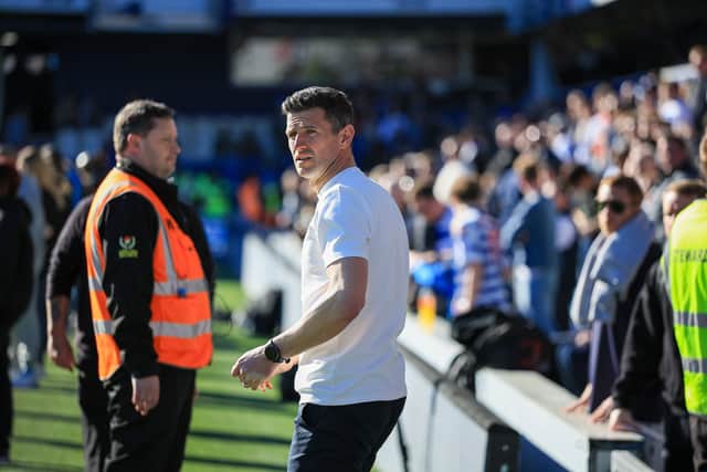 Pompey boss John Mousinho at Loftus Road. Picture: Chris Foxwell/ProSportsImages
