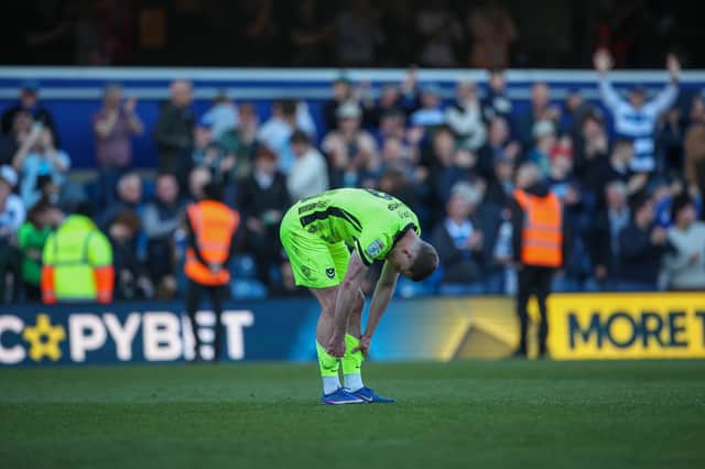 Colby Bishop was dejected after Pompey's 6-1 humiliation at QPR. Picture: Chris Foxwell/ProSportsImages