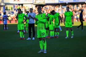 Zak Swanson applauds supporters at the final whistle following Pompey's 6-1 loss at QPR. Picture: Chris Foxwell/ProSportsImages