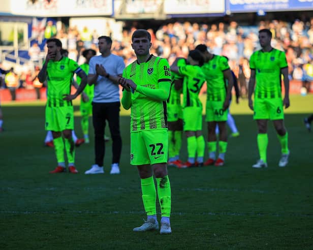 Zak Swanson applauds supporters at the final whistle following Pompey's 6-1 loss at QPR. Picture: Chris Foxwell/ProSportsImages