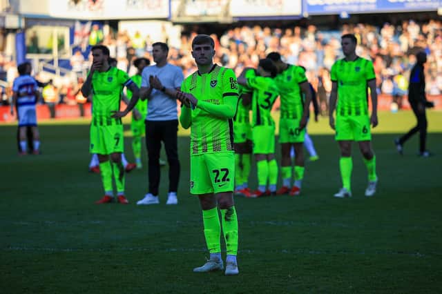 Zak Swanson applauds supporters at the final whistle following Pompey's 6-1 loss at QPR. Picture: Chris Foxwell/ProSportsImages
