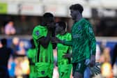 A visibly upset Ebou Adams was consoled by his team-mates after the final whistle on the 6-1 defeat at QPR. Picture: Chris Foxwell/ProSportsImages