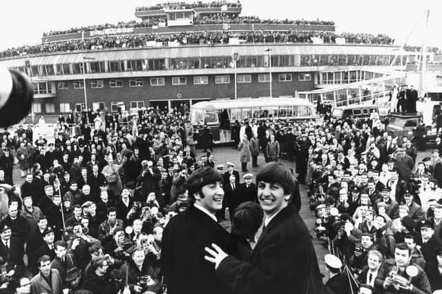 The Beatles arrive at London Heathrow Airport after a successful 10 day American tour.