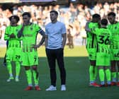 Pompey boss John Mousinho and his players at QPR. Picture: Chris Foxwell