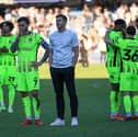 Pompey boss John Mousinho and his players at QPR. Pic: Chris Foxwell