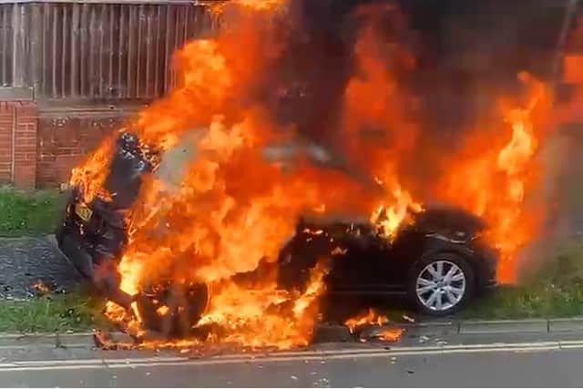 A car burst into flames